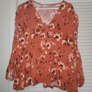 Floral fall orange peplum style blouse in the size XL